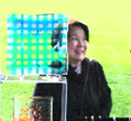 Eiko Emori with glass